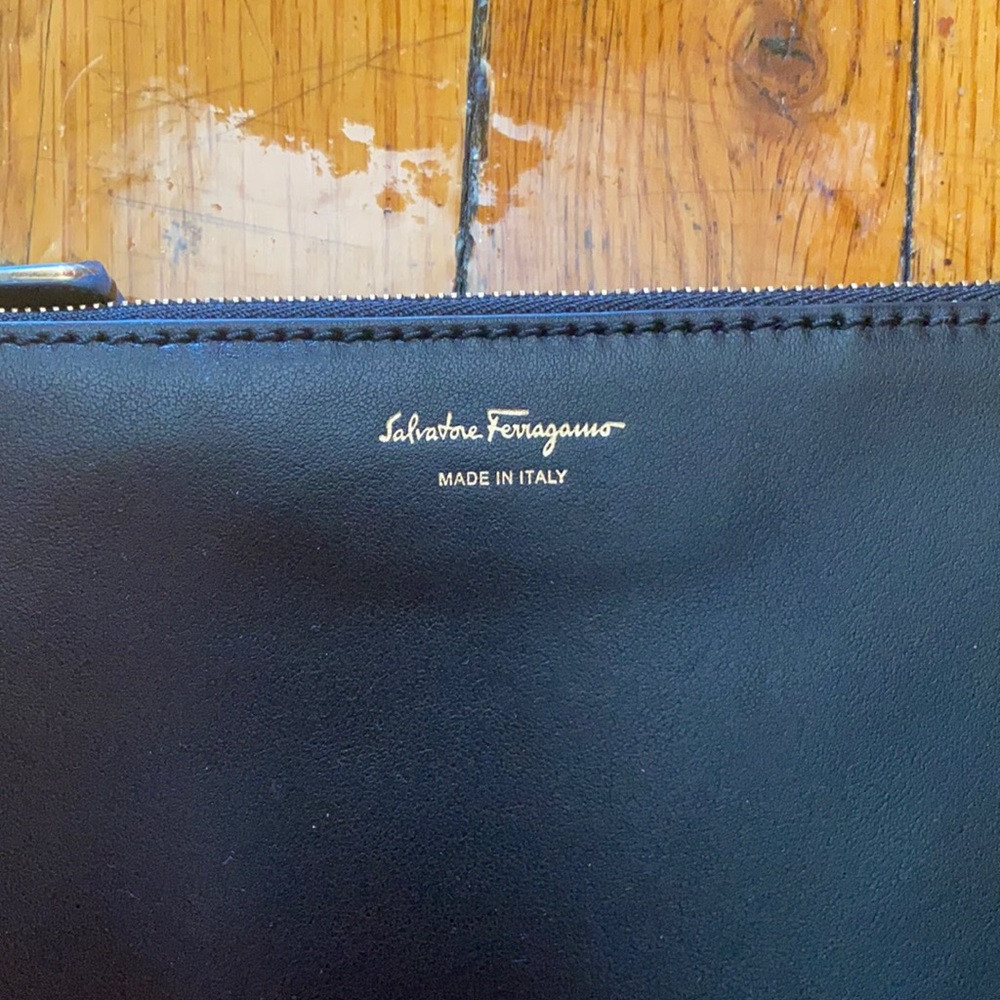 Brand New Salvatore Feragamo wrist leather black pouch